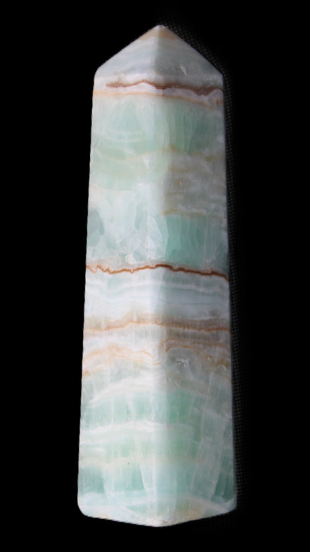 Pistachio Calcite obelisk 140mm 362g in sunlight - Rocks and Things Store