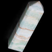 Pistachio Calcite obelisk 140mm 362g in sunlight - Rocks and Things Store