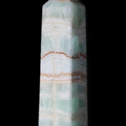 Pistachio Calcite obelisk 134mm 346g in sunlight - Rocks and Things Store