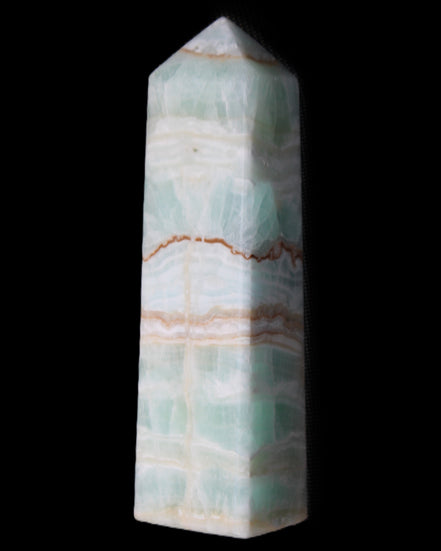 Pistachio Calcite obelisk 134mm 346g in sunlight - Rocks and Things Store