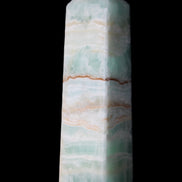 Pistachio Calcite obelisk 134mm 346g in sunlight - Rocks and Things Store