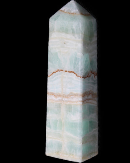 Pistachio Calcite obelisk 134mm 346g in sunlight - Rocks and Things Store