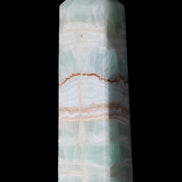 Pistachio Calcite obelisk 134mm 346g in sunlight - Rocks and Things Store