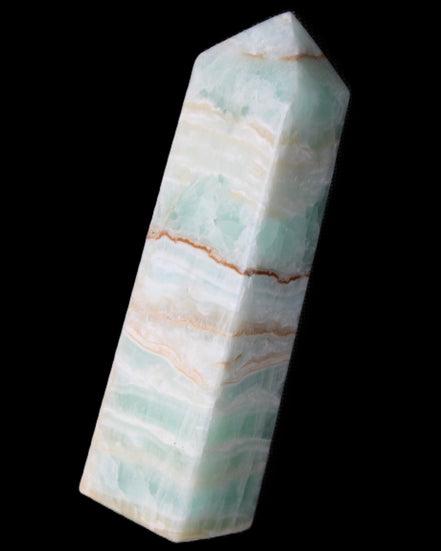 Pistachio Calcite obelisk 134mm 346g in sunlight - Rocks and Things Store