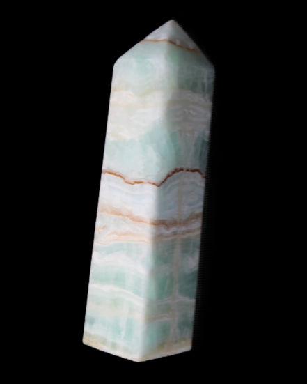 Pistachio Calcite obelisk 134mm 346g in sunlight - Rocks and Things Store