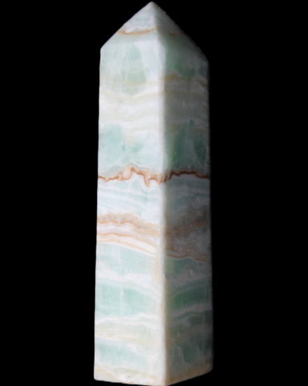 Pistachio Calcite obelisk 134mm 346g in sunlight - Rocks and Things Store
