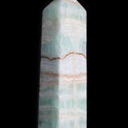 Pistachio Calcite obelisk 134mm 346g in sunlight - Rocks and Things Store