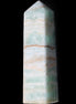 Pistachio Calcite obelisk 134mm 346g in sunlight - Rocks and Things Store