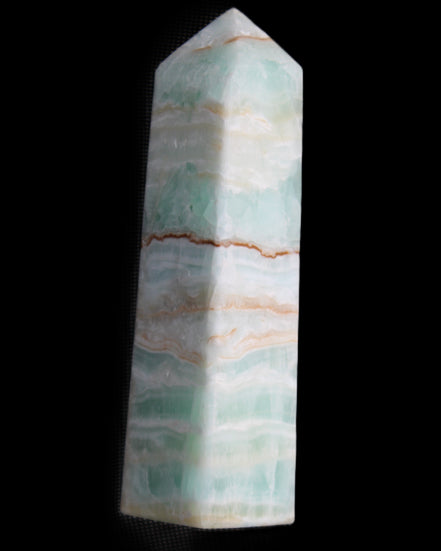 Pistachio Calcite obelisk 134mm 346g in sunlight - Rocks and Things Store