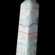 Pistachio Calcite obelisk 134mm 346g in sunlight - Rocks and Things Store