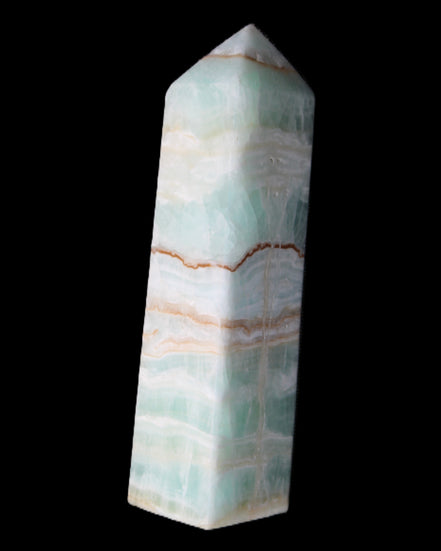 Pistachio Calcite obelisk 134mm 346g in sunlight - Rocks and Things Store