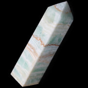 Pistachio Calcite obelisk 134mm 346g in sunlight - Rocks and Things Store