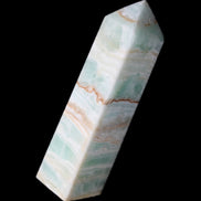 Pistachio Calcite obelisk 134mm 346g in sunlight - Rocks and Things Store