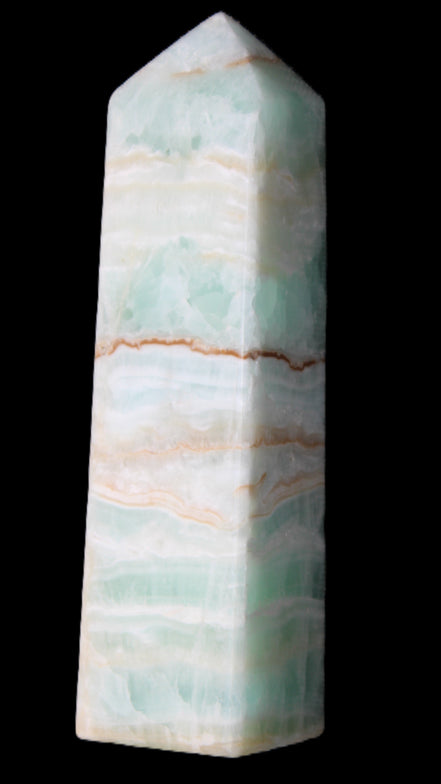 Pistachio Calcite obelisk 134mm 346g in sunlight - Rocks and Things Store