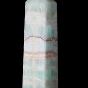 Pistachio Calcite obelisk 134mm 346g in sunlight - Rocks and Things Store