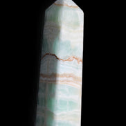 Pistachio Calcite obelisk 134mm 346g in sunlight - Rocks and Things Store