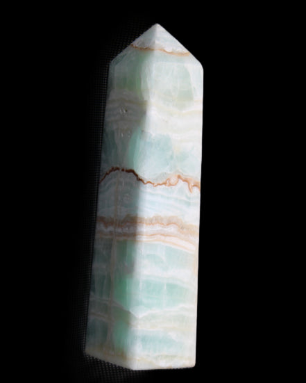 Pistachio Calcite obelisk 134mm 346g in sunlight - Rocks and Things Store