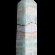 Pistachio Calcite obelisk 134mm 346g in sunlight - Rocks and Things Store