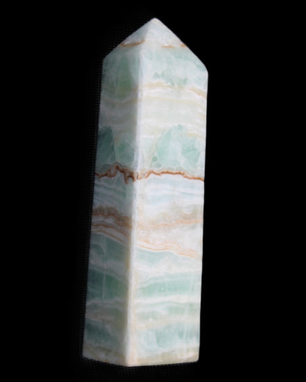 Pistachio Calcite obelisk 134mm 346g in sunlight - Rocks and Things Store