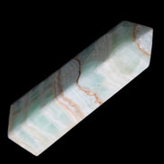 Pistachio Calcite obelisk 134mm 346g in sunlight - Rocks and Things Store