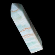 Pistachio Calcite obelisk 134mm 346g in sunlight - Rocks and Things Store