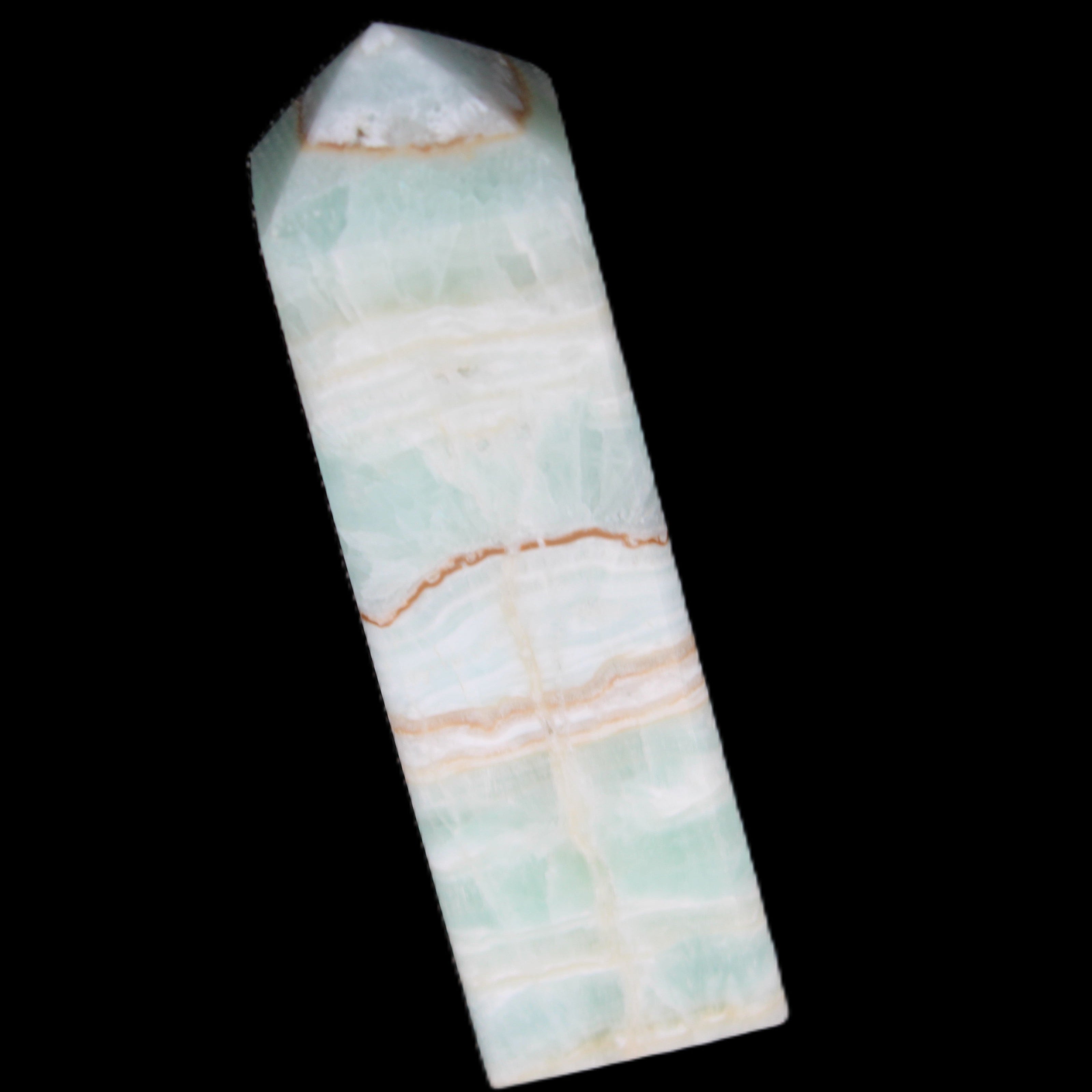 Pistachio Calcite obelisk 134mm 346g in sunlight - Rocks and Things Store