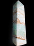 Pistachio Calcite obelisk 147mm 419g in sunlight - Rocks and Things Store