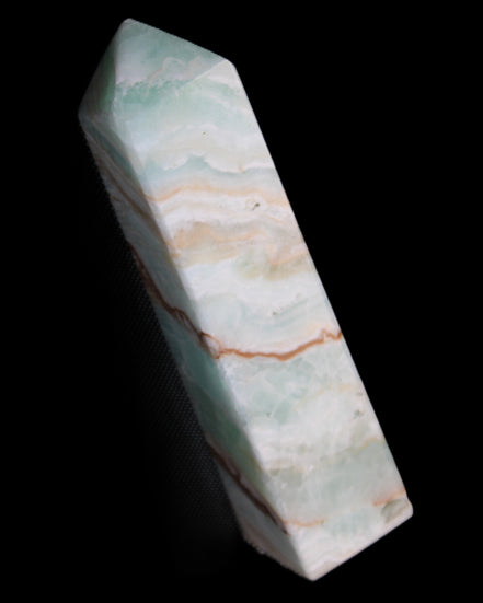 Pistachio Calcite obelisk 147mm 419g in sunlight - Rocks and Things Store