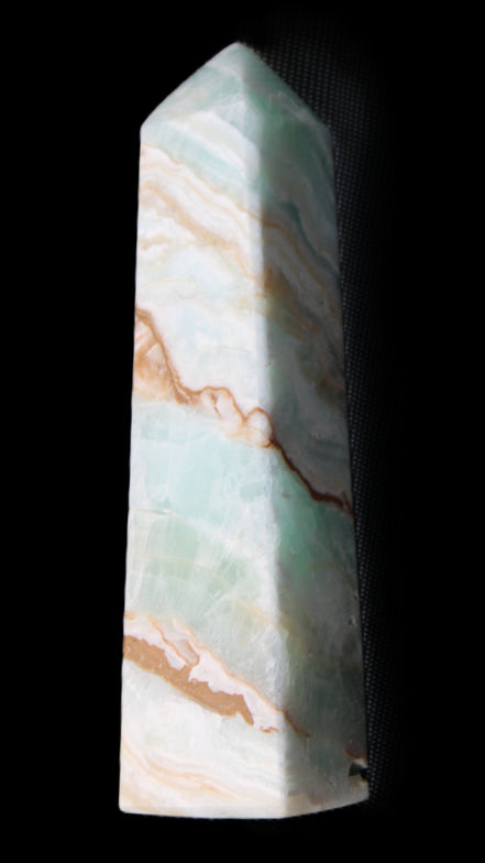 Pistachio Calcite obelisk 147mm 419g in sunlight - Rocks and Things Store