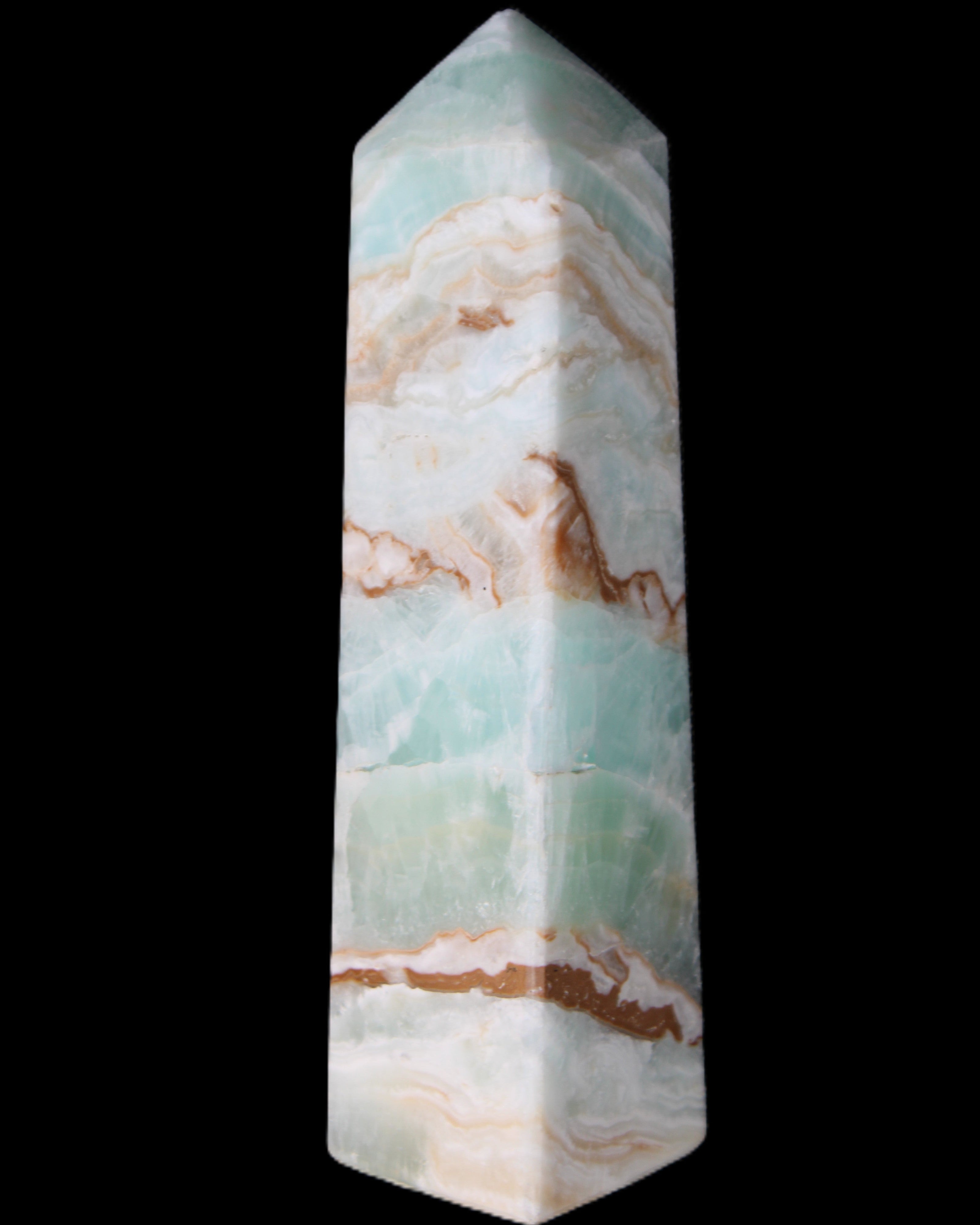 Pistachio Calcite obelisk 147mm 419g in sunlight - Rocks and Things Store