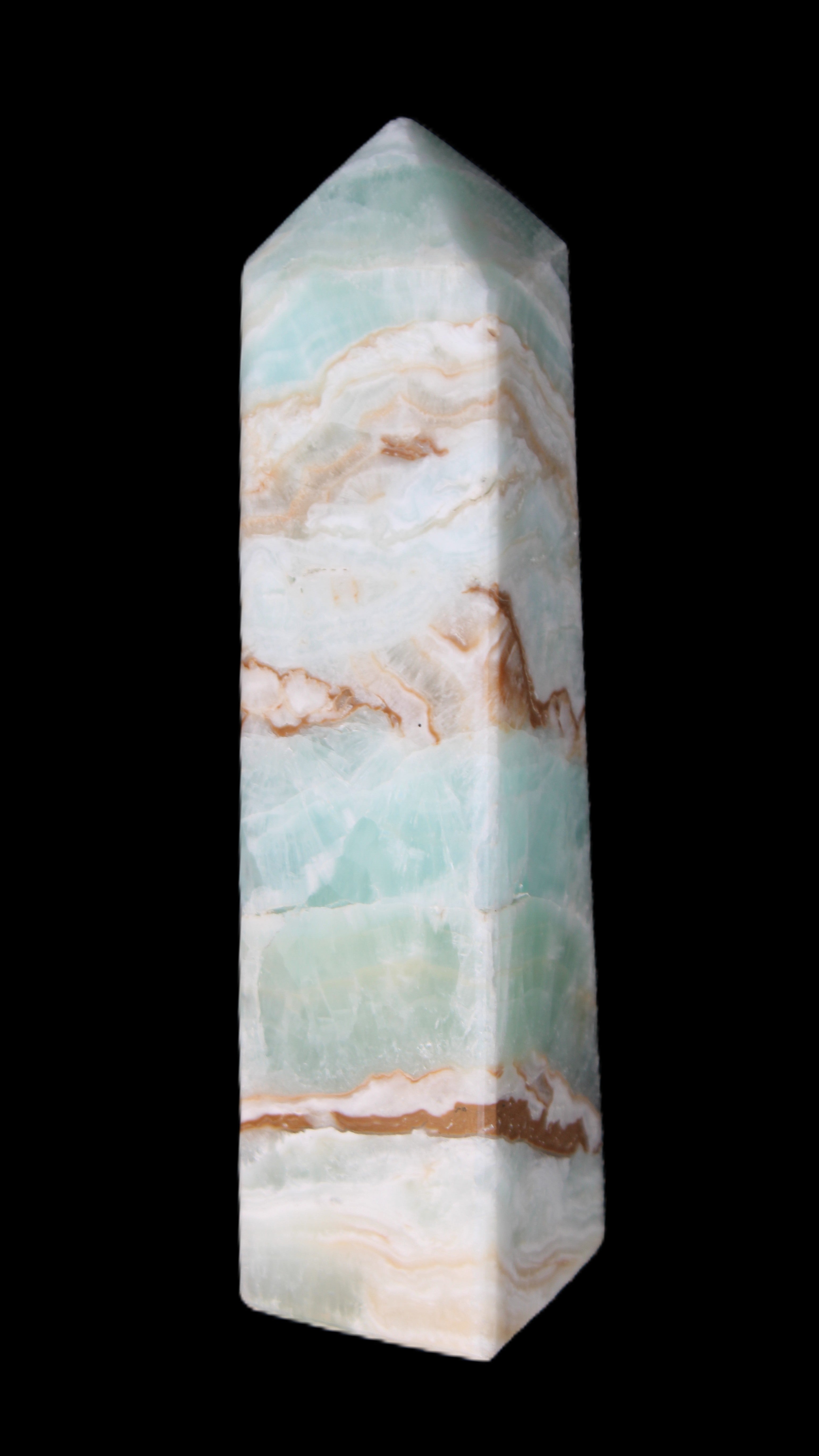 Pistachio Calcite obelisk 147mm 419g in sunlight - Rocks and Things Store