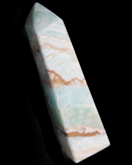 Pistachio Calcite obelisk 147mm 419g in sunlight - Rocks and Things Store