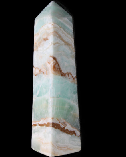 Pistachio Calcite obelisk 147mm 419g in sunlight - Rocks and Things Store