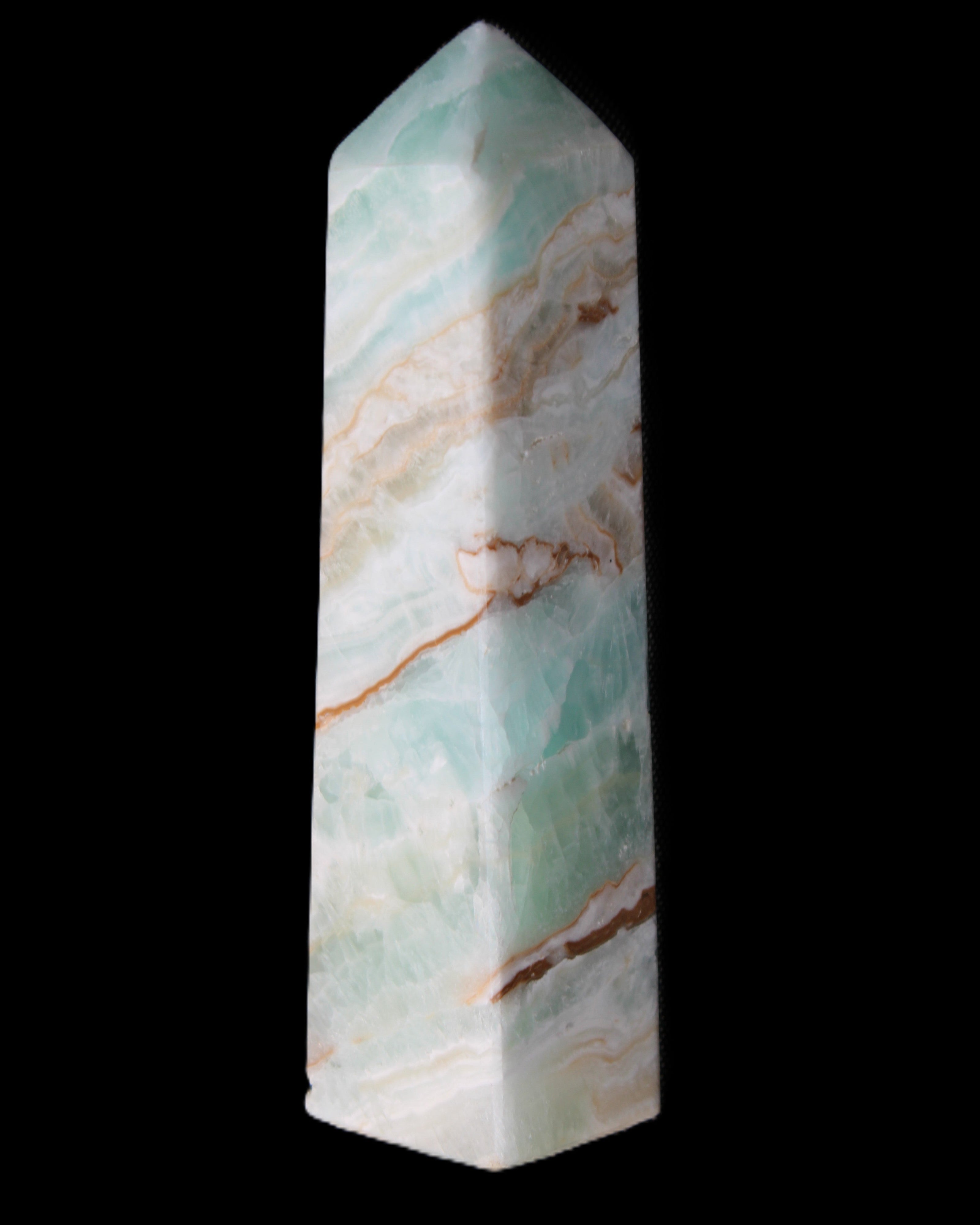 Pistachio Calcite obelisk 147mm 419g in sunlight - Rocks and Things Store