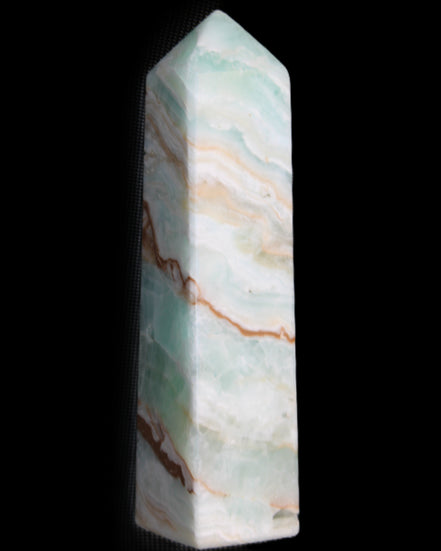 Pistachio Calcite obelisk 147mm 419g in sunlight - Rocks and Things Store