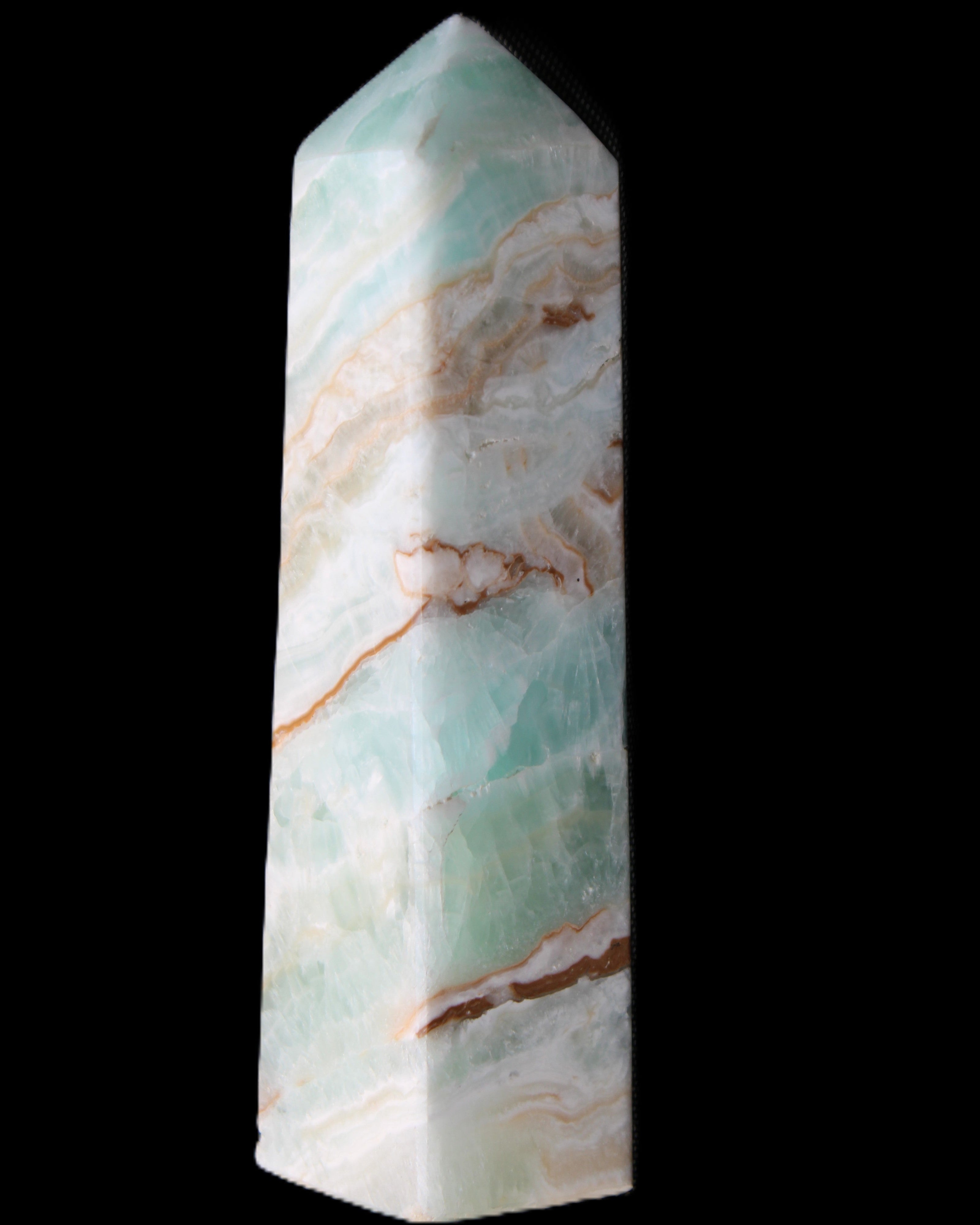 Pistachio Calcite obelisk 147mm 419g in sunlight - Rocks and Things Store