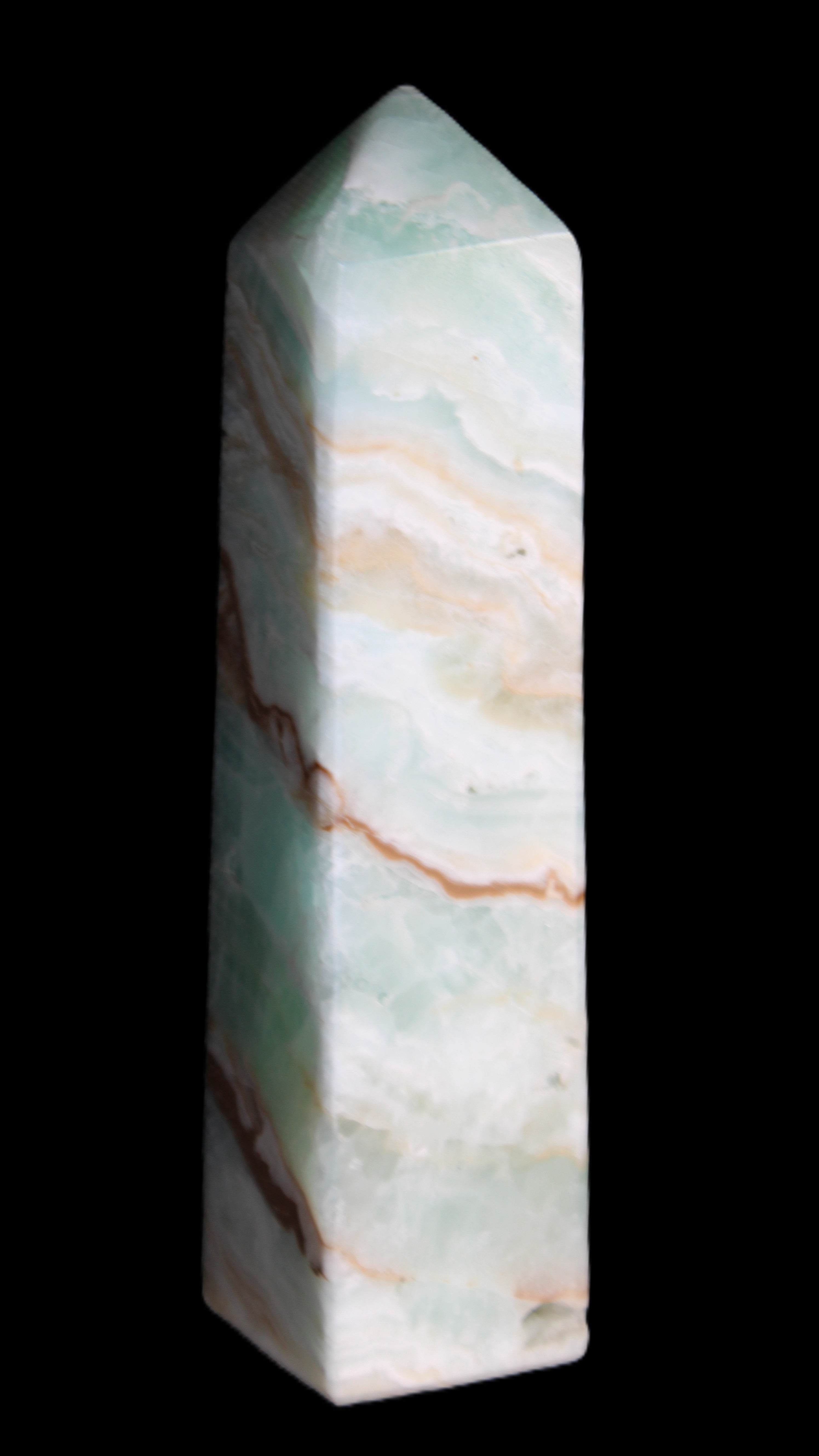 Pistachio Calcite obelisk 147mm 419g in sunlight - Rocks and Things Store
