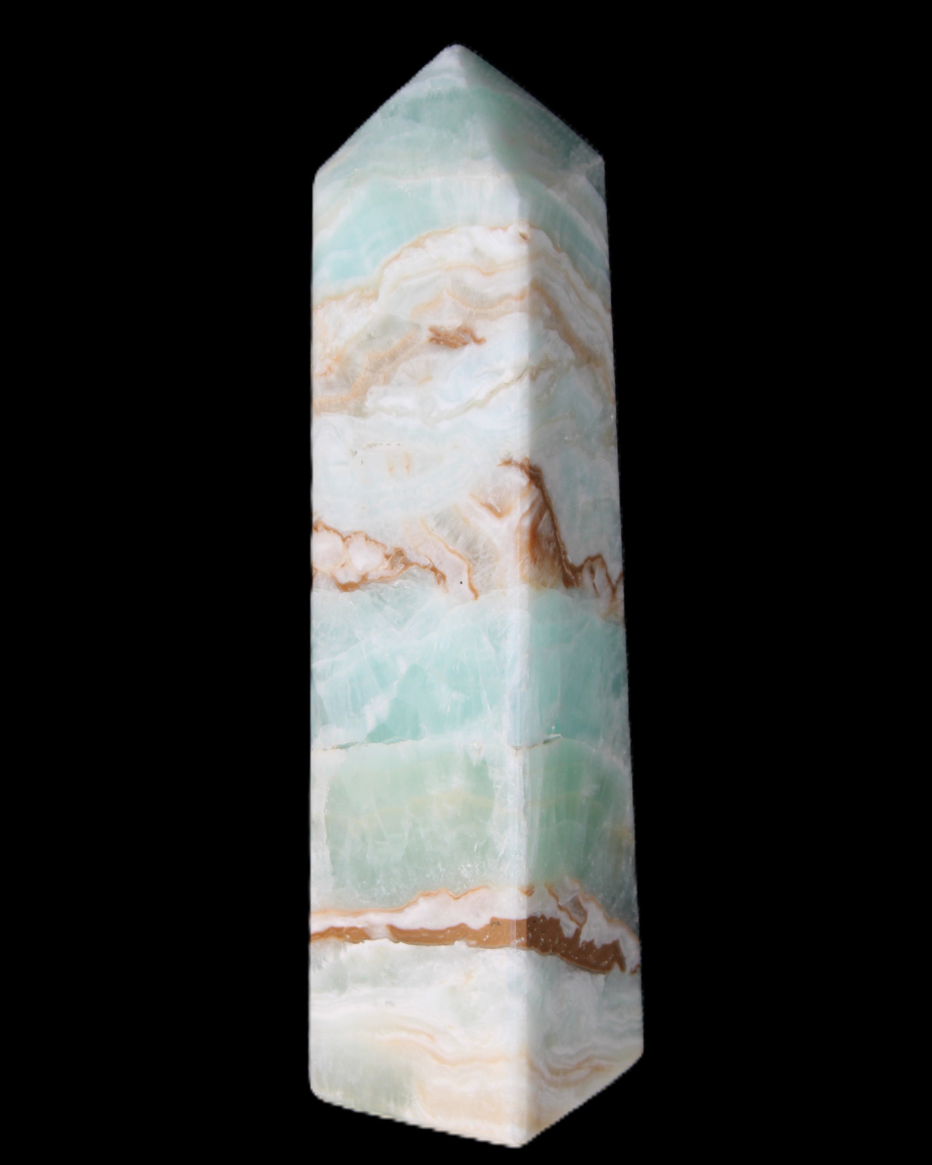 Pistachio Calcite obelisk 147mm 419g in sunlight - Rocks and Things Store