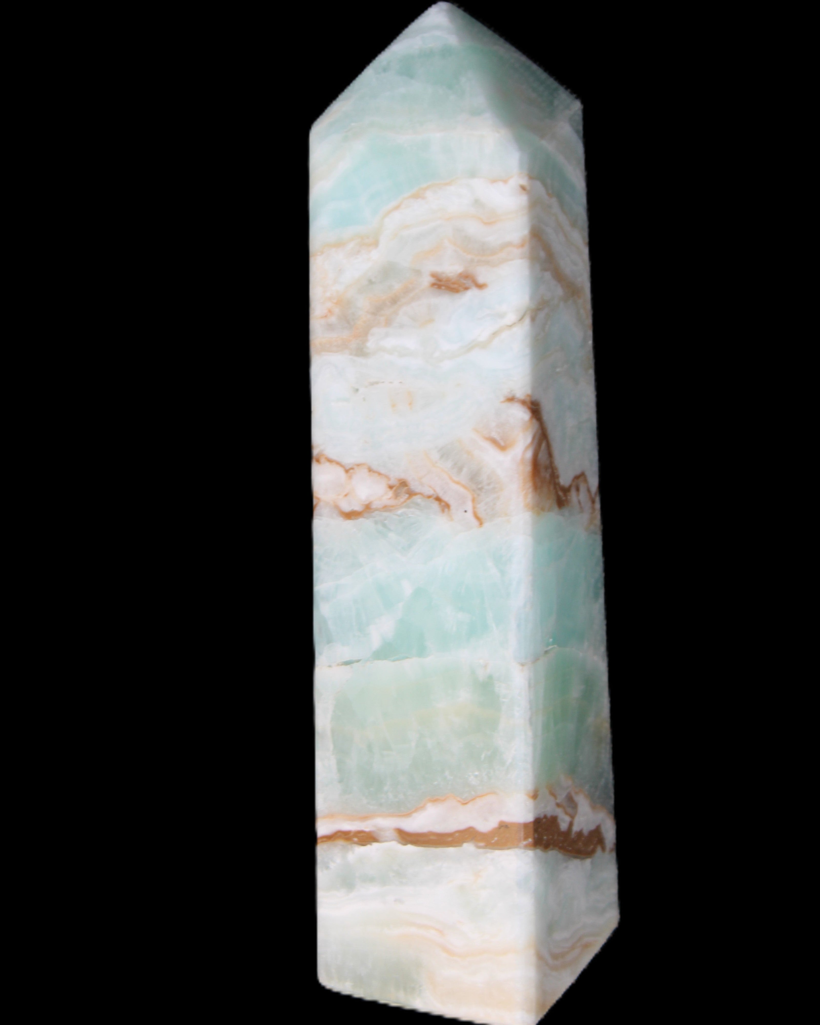 Pistachio Calcite obelisk 147mm 419g in sunlight - Rocks and Things Store