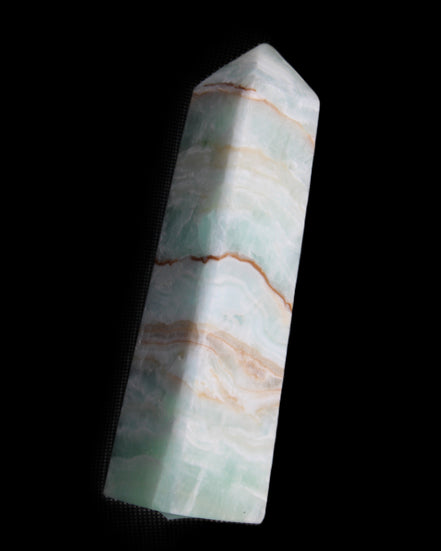 Pistachio Calcite obelisk 134mm 339g in sunlight - Rocks and Things Store