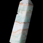 Pistachio Calcite obelisk 134mm 339g in sunlight - Rocks and Things Store