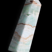 Pistachio Calcite obelisk 134mm 339g in sunlight - Rocks and Things Store