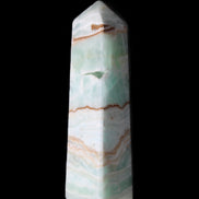 Pistachio Calcite obelisk 134mm 339g in sunlight - Rocks and Things Store