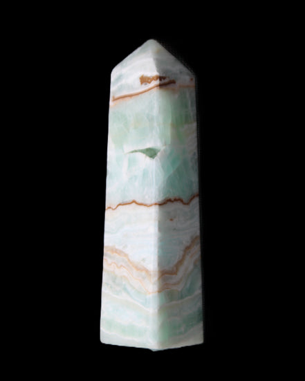 Pistachio Calcite obelisk 134mm 339g in sunlight - Rocks and Things Store