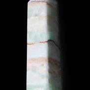 Pistachio Calcite obelisk 134mm 339g in sunlight - Rocks and Things Store