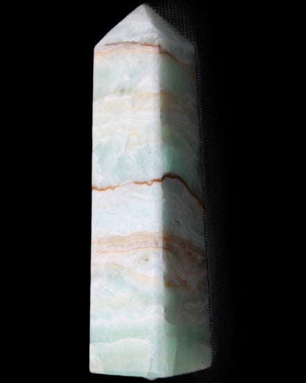 Pistachio Calcite obelisk 134mm 339g in sunlight - Rocks and Things Store