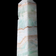 Pistachio Calcite obelisk 134mm 339g in sunlight - Rocks and Things Store