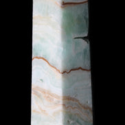 Pistachio Calcite obelisk 134mm 339g in sunlight - Rocks and Things Store
