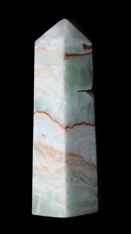 Pistachio Calcite obelisk 134mm 339g in sunlight - Rocks and Things Store