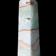 Pistachio Calcite obelisk 134mm 339g in sunlight - Rocks and Things Store